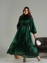 Yezwe emerald green modest maxi dress with long sleeves and waist tie belt on model